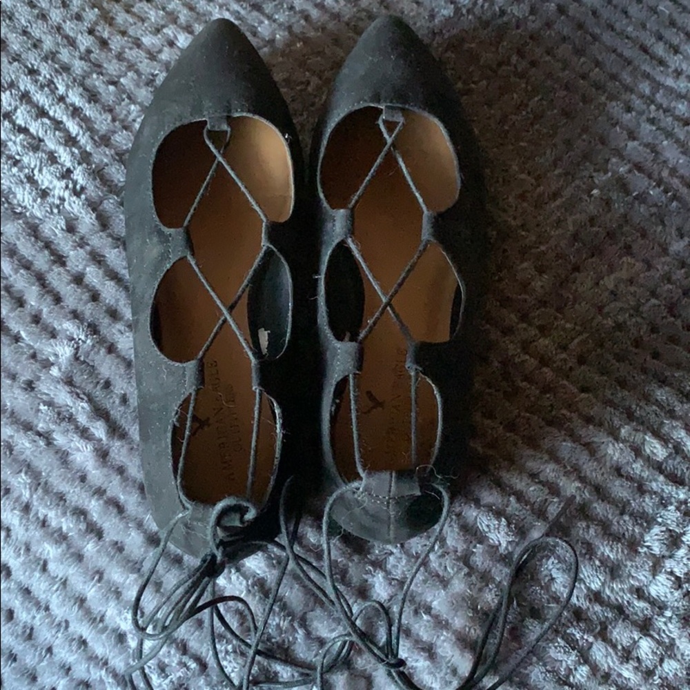 Black lace-up flats